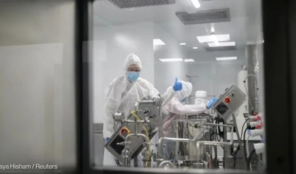 People working in factory environment